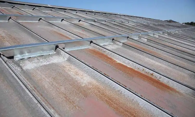 can you paint rusty metal roof