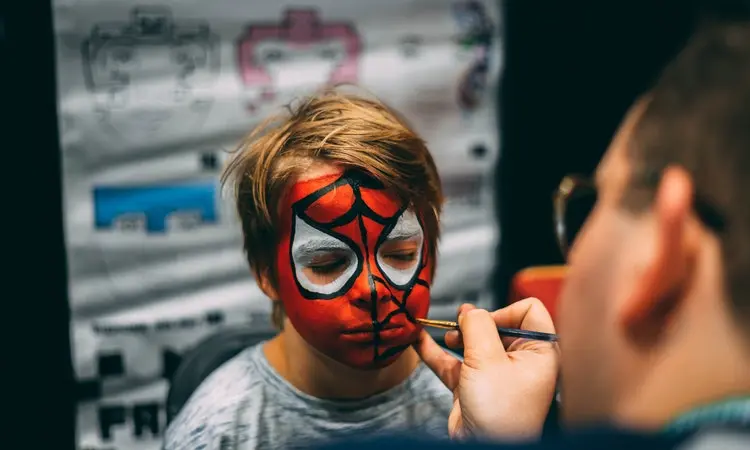 acrylic paint on a kid's face